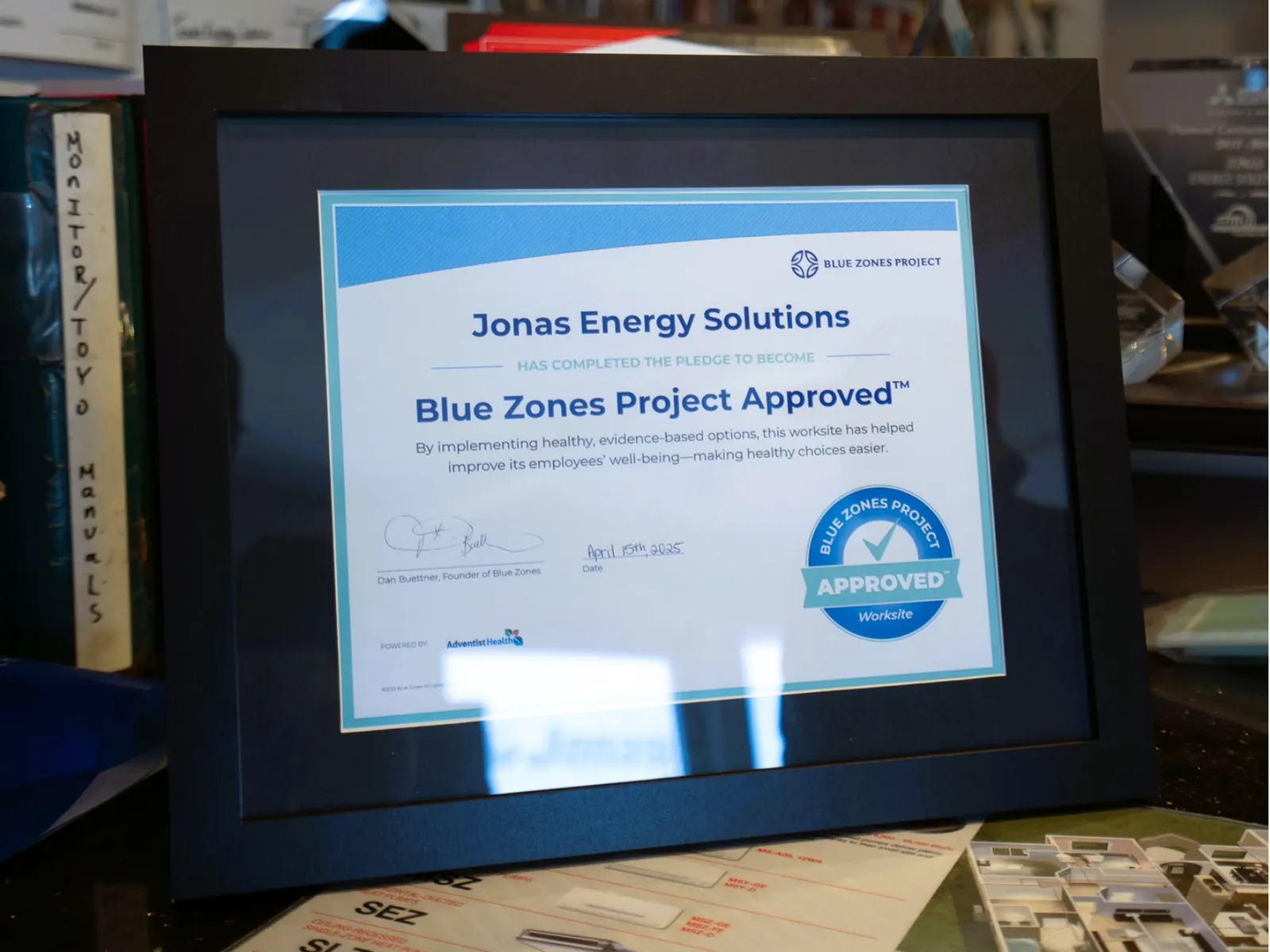 Framed Blue Zones Project Approved™ certificate awarded to Jonas Energy Solutions for promoting workplace health and wellness in Lake County.